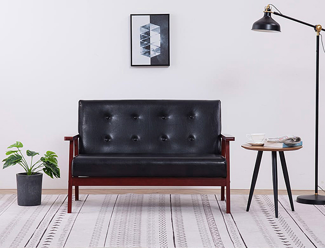 Czarna sofa retro Vita 2X tapicerowana