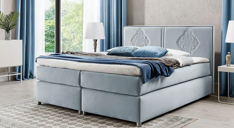 Łózko kontynentalne w kolorze błękitnym 