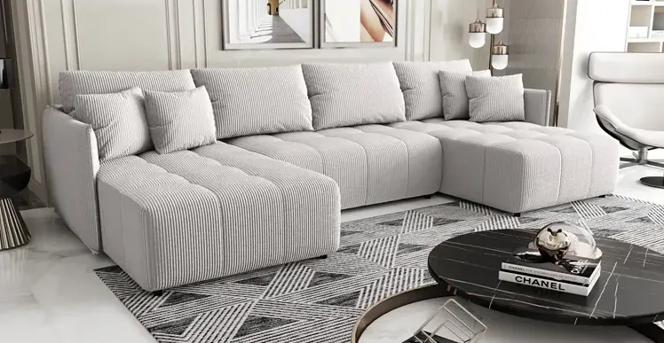 Szary narożnik w salonie